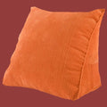 Orange coussin de lecture au lit