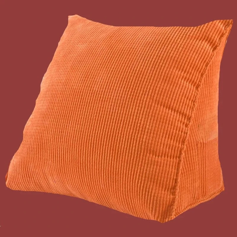 Orange coussin de lecture au lit